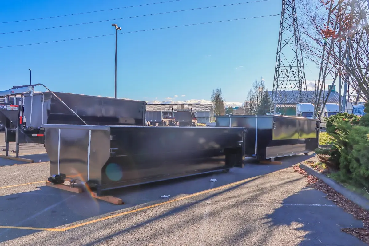 Roll-off dumpster ready for waste disposal at job site for Demolition Dumpster Rental in Lake Norman of Iredell